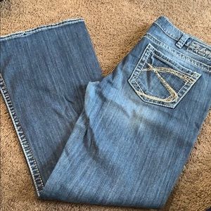Light distressed Silver Jeans Lola Flare
